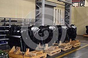 Large new diesel engines in the workshop of the factory for the production of trucks. Car`s motor.