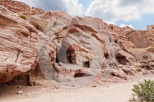 A large number of the burial caves dug into the rocks by the Nabateans in the Nabatean Kingdom of Petra in the Wadi Musa city in