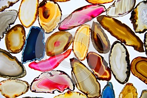 Large number of colored agates, faceted stones for decoration
