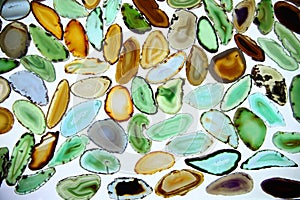 Large number of colored agates, faceted stones