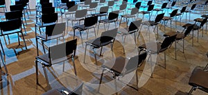 A large number of conference chairs in the auditorium perspective