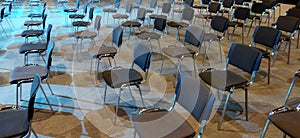 A large number of conference chairs in the auditorium perspective