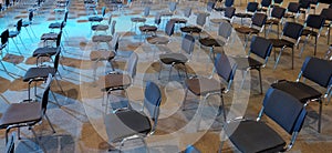 A large number of conference chairs in the auditorium perspective