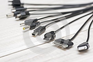 A large number of different connectors for connecting various gadgets via USB port to a laptop or computer. The concept of