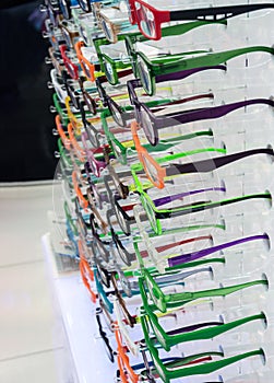 A large number of different spectacles in multi-colored frames