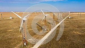 a large number of windmills, clean energy from wind, electricity production without harming nature.