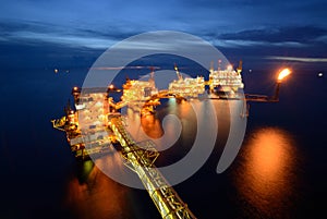 The large offshore oil rig drilling platform at night