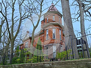 Large old brick house with turret