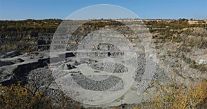 Large open iron ore quarry, panorama of a large stone quarry, equipment in the quarry