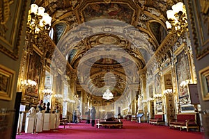 the large, ornate ceiling inside a palace with many chandeliers