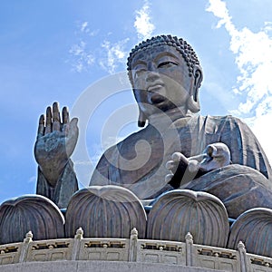 Outdoor bronze statue of seated Tian Tan Buddha in Hong Kong