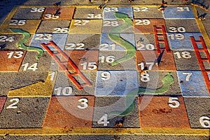 Large outdoor snakes and ladders game