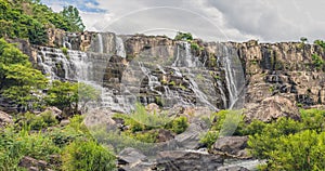 Large panorama of Amazing Pongour Waterfall is famous and most beautiful of fall in Vietnam. Not far from Dalat city estimate 45 K