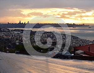 Large panoramic view  of  lebanese shore Kaslik Jounieh until Beirut in a far end in a golden light photo