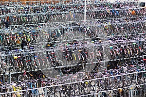 Large parking Bicycle in Delft near train station. Holland city-bike life.