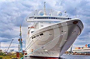 Large passenger ship from the front in the industrial port in Wismar on the Baltic Sea