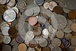 A large pile of different Russian coins and coins of other countries