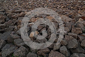 Large pile of granite rocks .