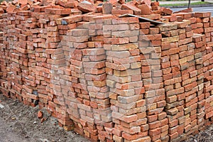 Large pile of red bricks