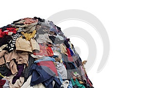 large pile stack of textile fabric clothes and shoes. concept of recycling, up cycling, awareness to global climate change