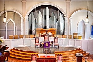 A large pipe organ in a church.