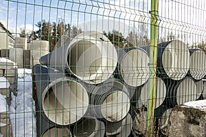 large plastic drainage pipes on the construction store site