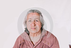 large portrait of an old woman on an isolated white background