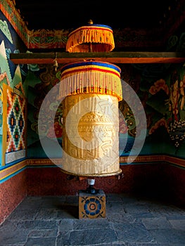 Large prayer wheel for good karma in Bhutan