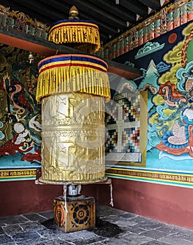 Large prayer wheel for good karma at the Punakha Dzong in Bhutan