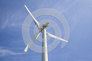 Large propeller blades from a wind generator of electric power against the blue sky