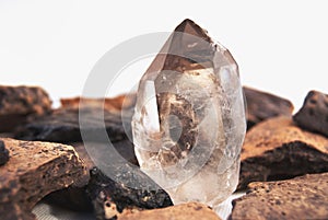 Large quartz crystal on white background close-up