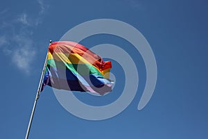 Large Rainbow Flag Blowing in the Wind