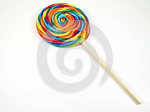 Large Rainbow Lollipop Swirl on a Stick Isolated