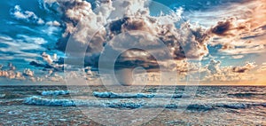 Large raining storm cloud over the open ocean