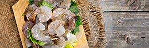 Large Raw Shrimp on Wooden Background