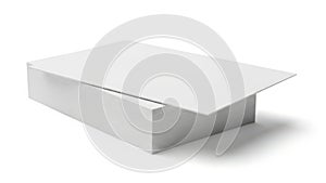 A large rectangular block of white foam resting on a white background