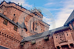 Large red brick castle of Haut-Koenigsbourg in Alsace, France in rock