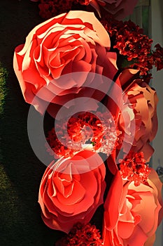 Large red decorative paper flowers