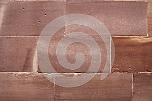 Large red marble stone bricks wall