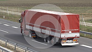 Large Red Truck on Highway