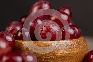 large red wet grapes in drops of water