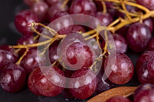 large red wet grapes in drops of water