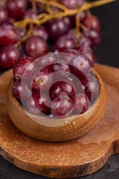 large red wet grapes in drops of water