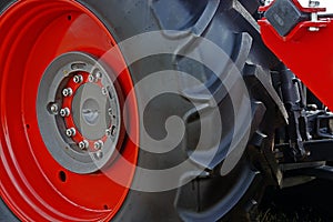 Large red wheel rim with rubber