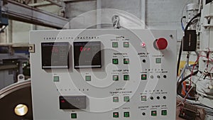 A large remote control of an industrial installation in an enterprise. Buttons