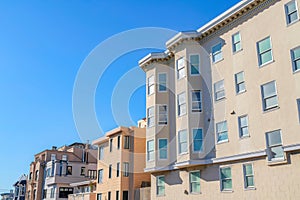 Large residential buildings in a row in an urban area at San Francisco, CA