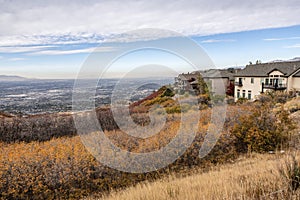 Large residential buildings at Utah with vast field of shrubs and bushes nearby