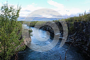 Large river in the arctic tundra. Abisko national park, Nothern Sweden