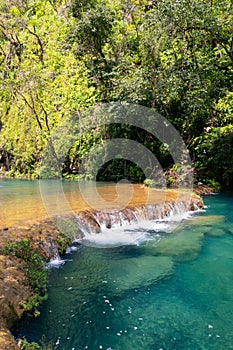 Large river and Semuc Champey natural monument in Guatemala, vertical