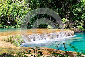 Large river and Semuc Champey natural monument in Guatemala, vertical